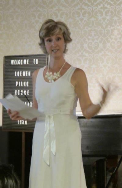 Jacqueline speaking at a recital, June 2014